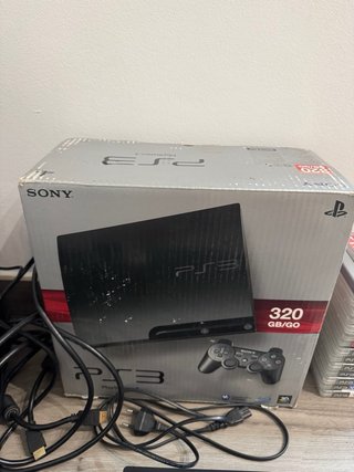 PS3 Slim 320GB + Volante + 2 Mandos + 14 Juegos