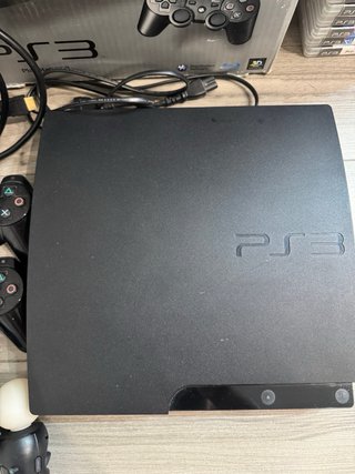 PS3 Slim 320GB + Volante + 2 Mandos + 14 Juegos