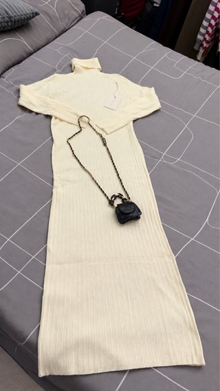 Vestido de Punto Cuello Alto con bolsito incluido