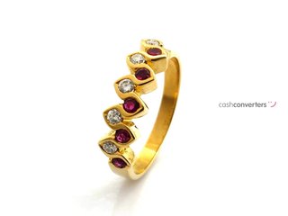 anillo oro 18k con piedra con diamante,rubi