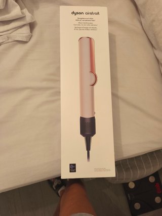 Piastra per capelli Dyson Airstrait rosa e bianco
