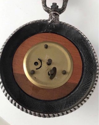 Reloj de bolsillo antiguo con colgante