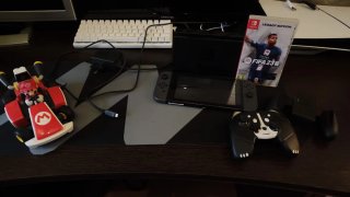 Nintendo Switch + FIFA 23 + Accessori