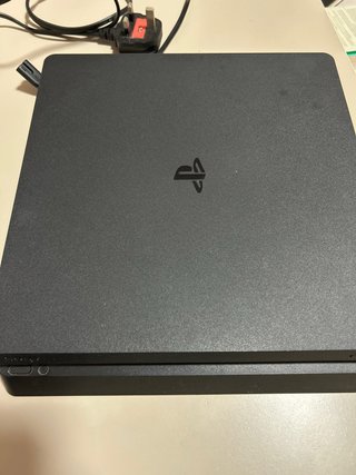 PS4 (PlayStation 4) con 2 mandos y juegos