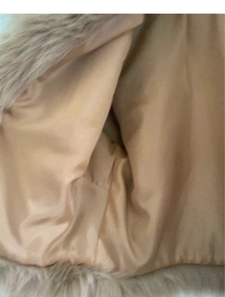 Giacca in pelliccia sintetica beige