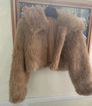 Giacca in pelliccia sintetica beige