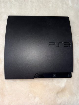PS3 slim + mando original + 22 juegos