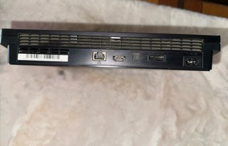 PS3 slim + mando original + 22 juegos