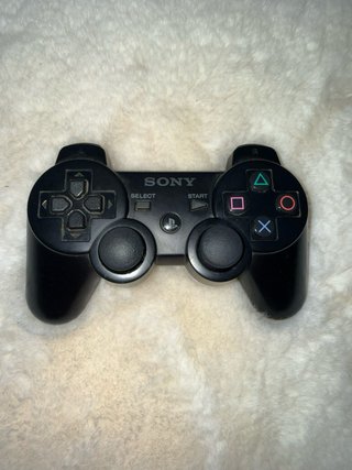 PS3 slim + mando original + 22 juegos