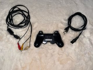 PS3 slim + mando original + 22 juegos