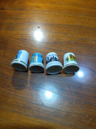 Set di 4 ditali in ceramica