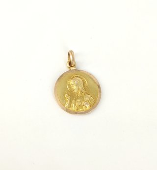 Medalla de oro de 18k, 1.89 g.