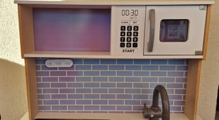 Cocina de juguete con microondas y horno