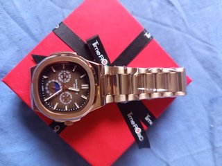 Reloj Estilo Nautilus Multifunción Oro Rosa