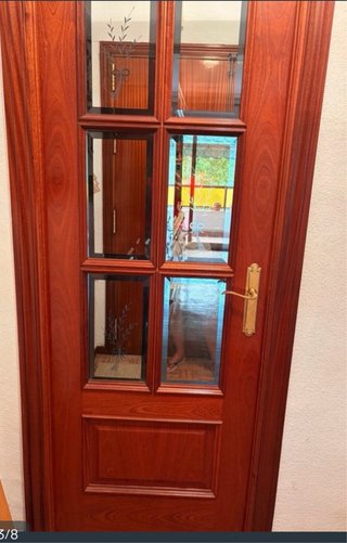 Puerta madera maciza acristalada ( tengo dos )