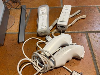 Consola Nintendo Wii con mando y juego