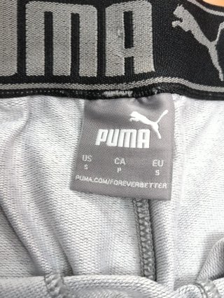 Pantalón corto chándal Puma gris y negro
