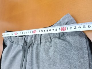 Pantalón corto chándal Puma gris y negro