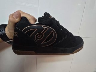 Zapatillas Heelys negras y doradas