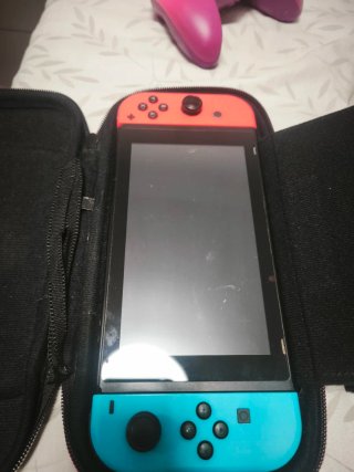Nintendo Switch + FIFA 22 + Accessori