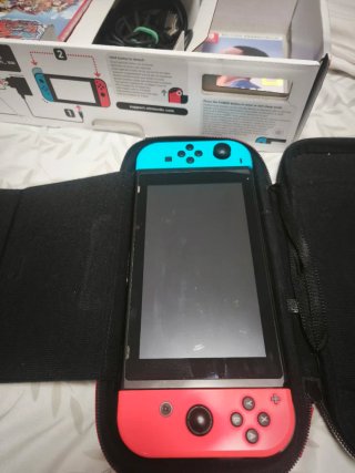 Nintendo Switch + FIFA 22 + Accessori