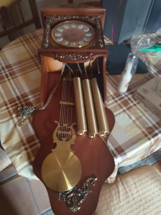 Reloj de pared madera y latón