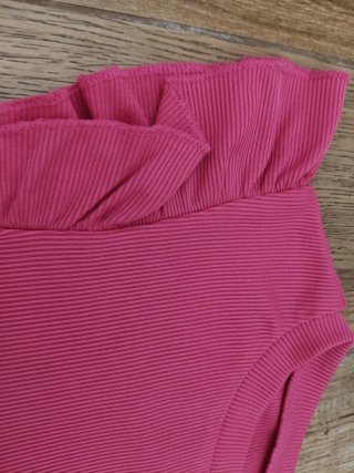 Blusa rosa con volantes