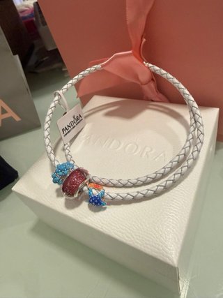 Pulsera doble Pandora dorada y blanca