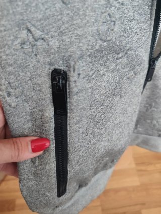 Sudadera con cremallera gris