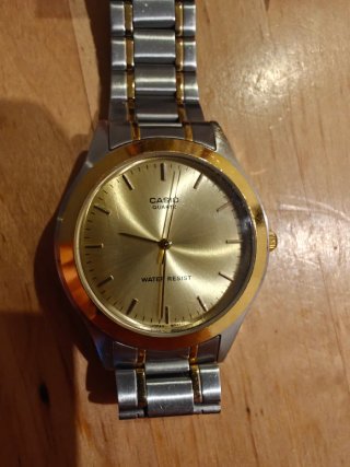Reloj Casio MTP-1128 Dorado y Plateado