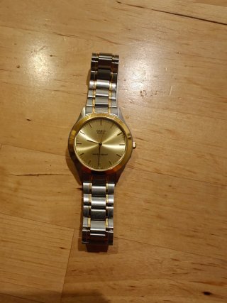 Reloj Casio MTP-1128 Dorado y Plateado