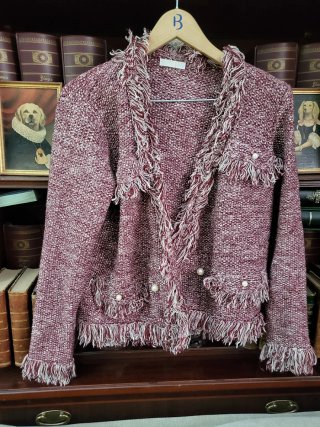 Chaqueta de punto con flecos