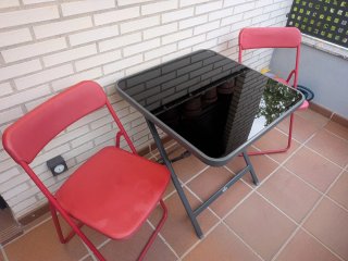 Mesa cristal y 2 sillas plegables exterior