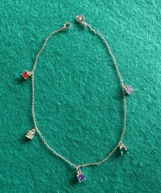 Pulsera plata con piedras de colores