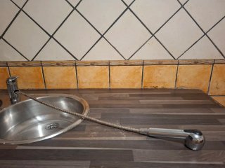 Fregadero doble con grifería acero inox