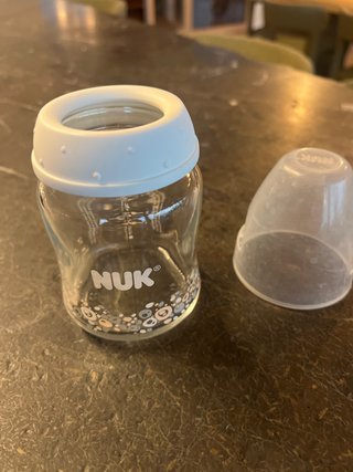 Biberón NUK de vidrio