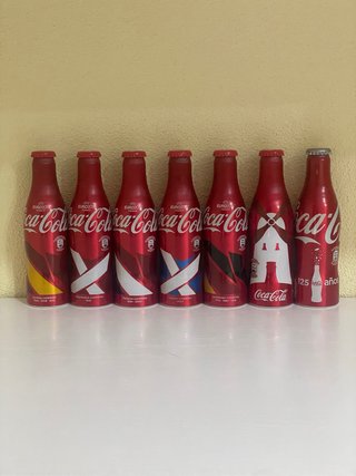 Set di 7 bottiglie di alluminio Coca-Cola