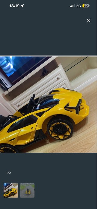 Coche eléctrico infantil amarillo