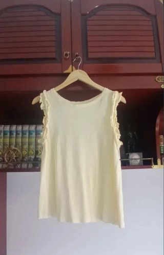Camiseta sin mangas amarilla