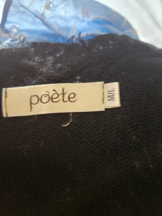 Jersey de punto negro con encaje