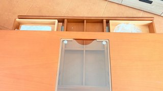 Mesa de centro elevable madera y cristal.