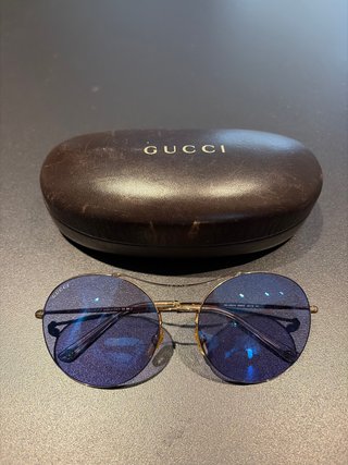 Gafas de sol Gucci redondas doradas