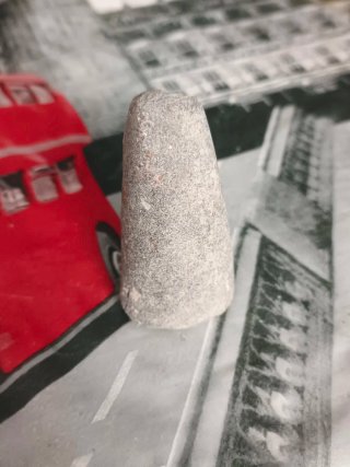 Pieza de piedra antigua.