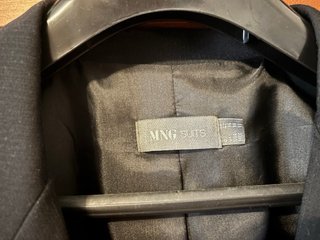 Elegante americana negra de mango