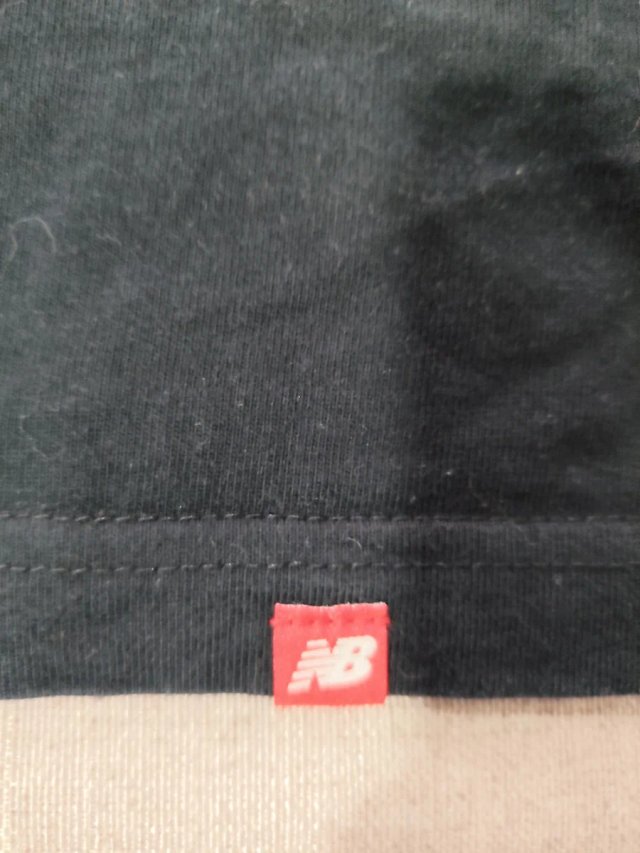 Camiseta New Balance Manga Larga Negra