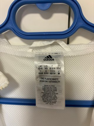 Chaqueta Adidas blanca con rayas. Buen estado