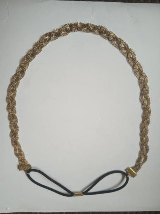 Diadema dorada trenzada Parfois