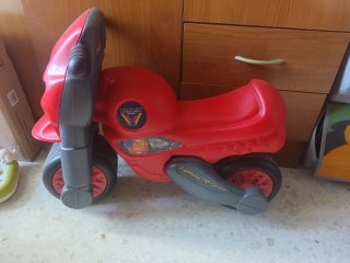 Moto de juguete para niños roja y gris