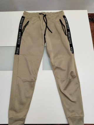 Pantalones de chándal beige con logo