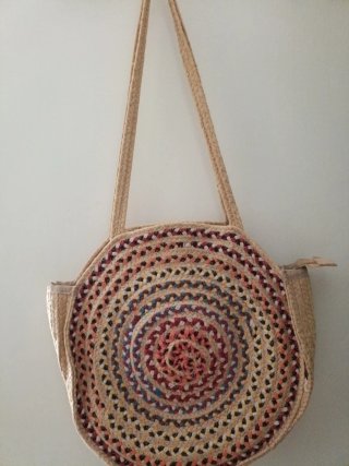 Bolso redondo tejido multicolor